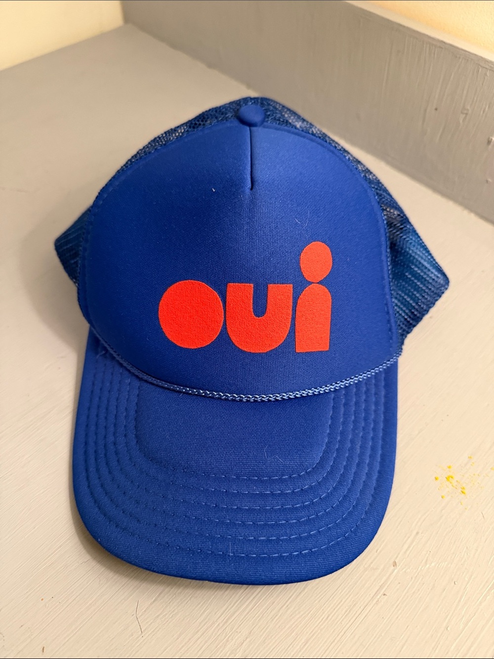Clare V Royal Blue Mesh Trucker Hat with Red 'oui' Logo
